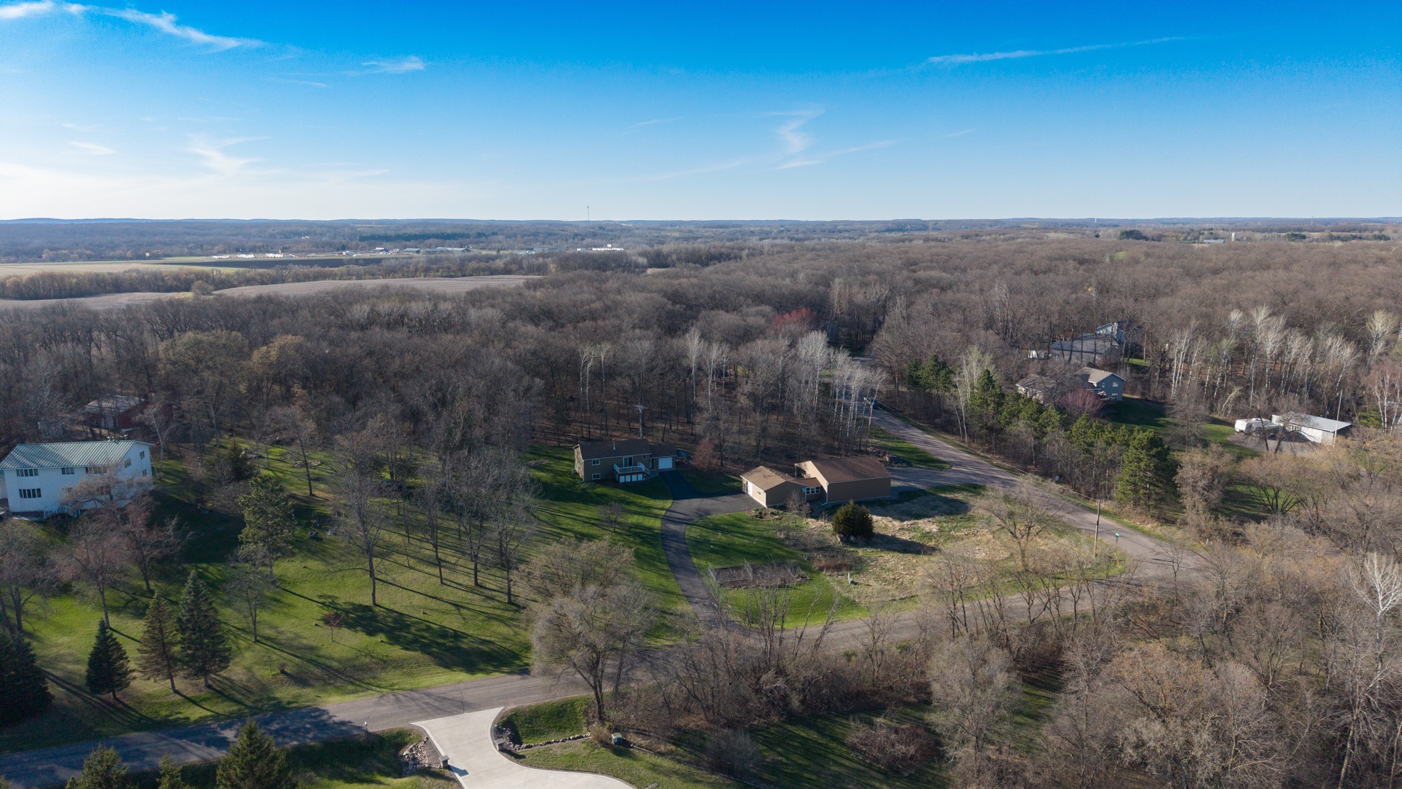 Aerial view of a wooded residential property in Minnesota